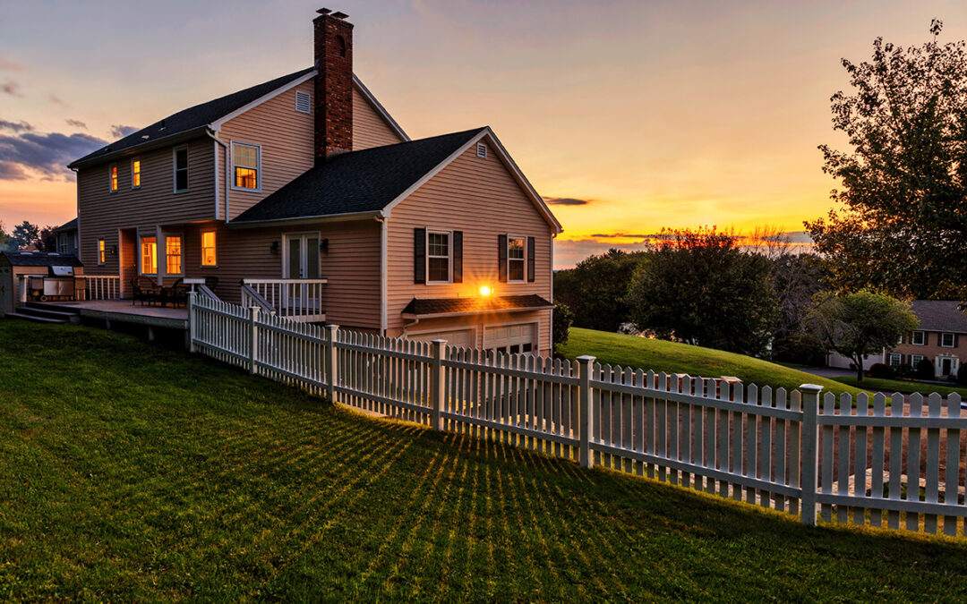 Beautiful colonial American house at sunset